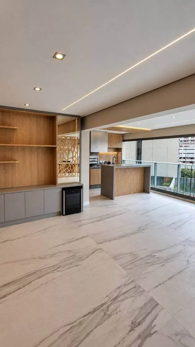 Sala integrada de apartamento reformado pela Morale Arquitetura e Reforma, com marcenaria sob medida e projeto de interiores